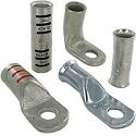 Various types of metal cable crimps and lugs.