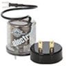 Portable camping stove with a gas canister and detachable pot stand.