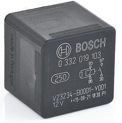 A black bosch relay sitting on top of a white table.