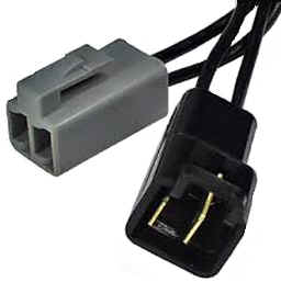 Three-prong plug with a plastic cap on the prongs.