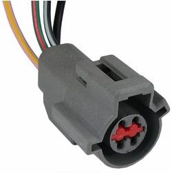 Electrical connector with a red retainer and attached multicolored wires.
