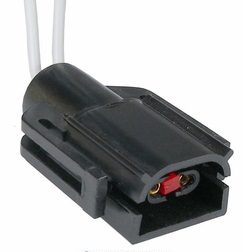 Two-pin electrical connector with attached white cables.