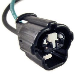 Two-pin electrical connector with wires attached.