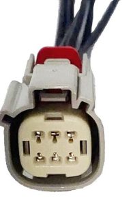 Electrical connector with multiple pins and wires, commonly used for automotive applications.