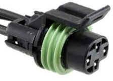 A black and green connector is shown.