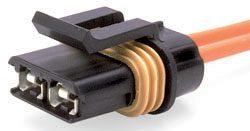 A black and yellow wire is connected to an electrical connector.