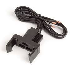 A black electrical outlet with wires attached to it.