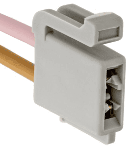 A close up of the wires on a white electrical outlet.