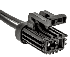 A black wire with an electrical connector attached to it.