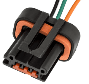 A black and orange wire is connected to an electrical connector.