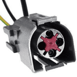 A picture of an electrical connector with wires.