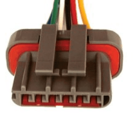 A picture of the front end of an electrical connector.