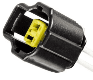 A close up of the connector on a car.