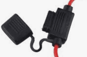 A red and black cable is connected to an electrical device.