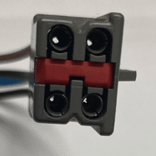 A close up of the four wires on a connector.