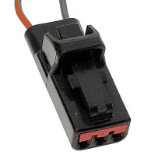 A black and red wire is connected to an electrical connector.