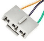 A white electrical connector with wires attached to it.